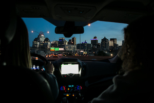 City skyline through the windshield of car