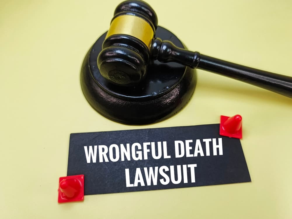 Wooden judge gavel on a table representing a wrongful death lawsuit, symbolizing legal justice, negligence claims, and court rulings in fatal cases.