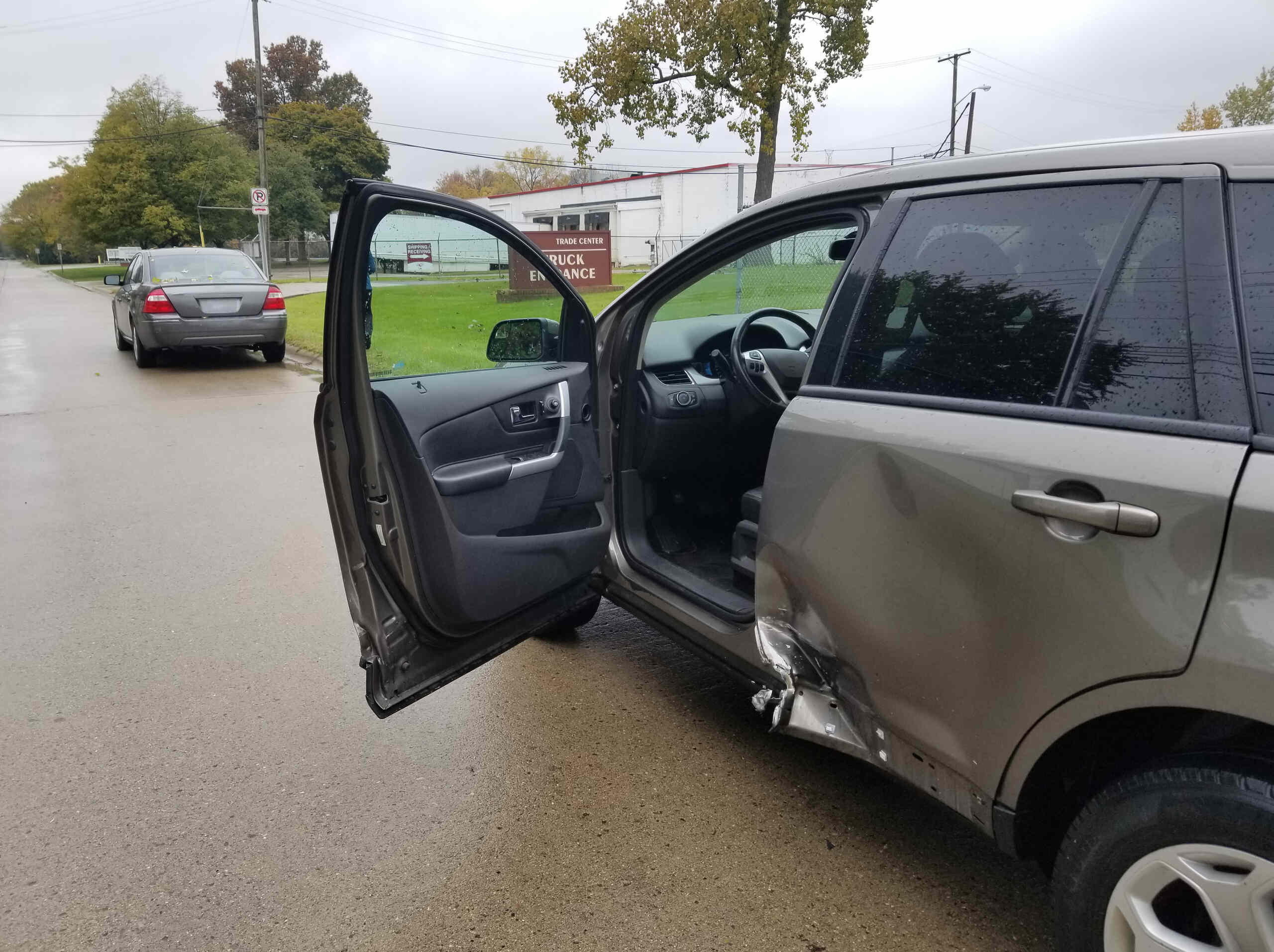 Florida T-bone accident aftermath showing side-impact damage to a vehicle at an intersection.