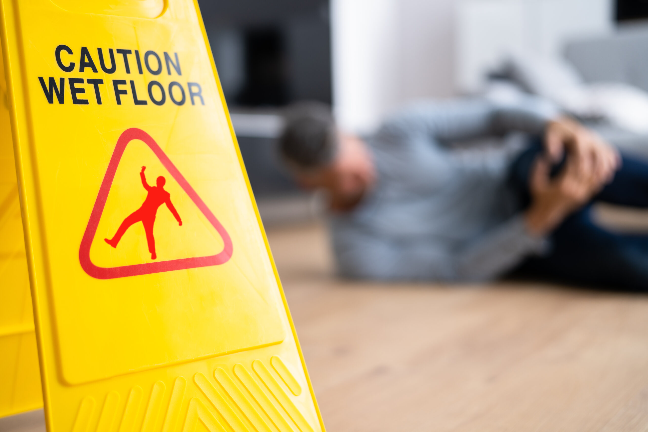 Legal concept of slip and fall accident liability in Florida with gavel and scales of justice